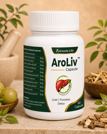 A white plastic bottle of Aroveda Life AroLiv Capsule liver and function detox supplement, styled on a beige stone surface with herbal ingredients like green amla fruits, dried roots, and leaves in the background.